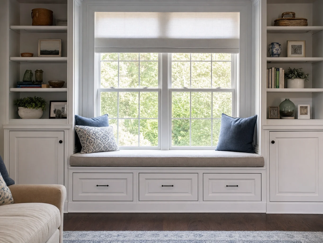 Built in window seat with drawers and flanking shelving