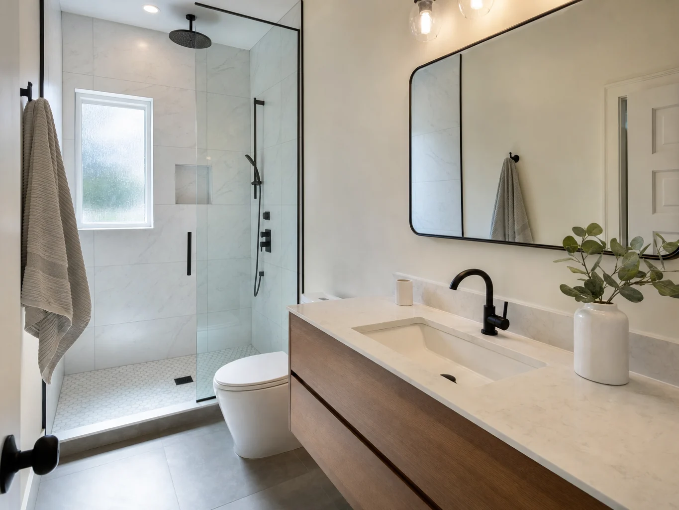 Bathroom renovation with tiled walk in shower and floating vanity