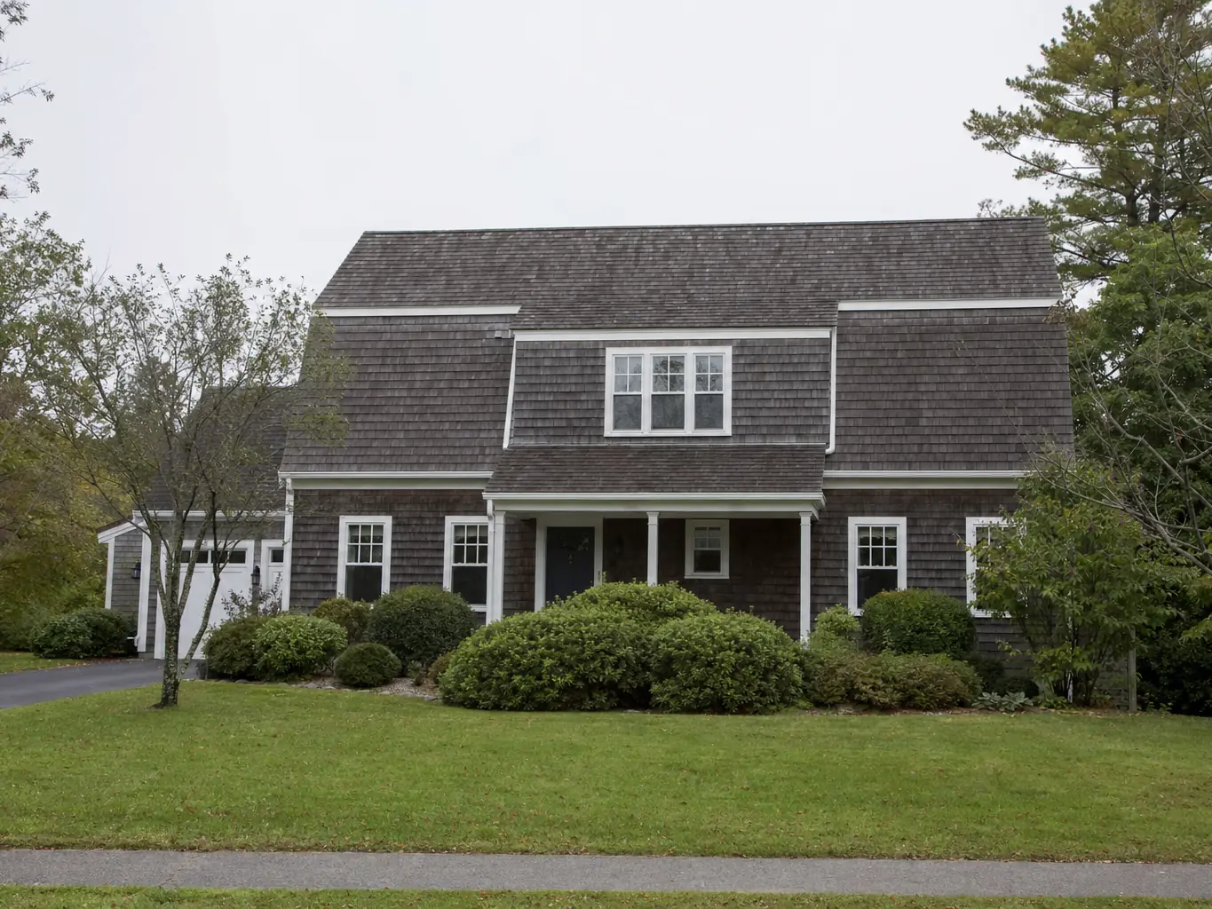 Completed roof replacement on a gambrel style home